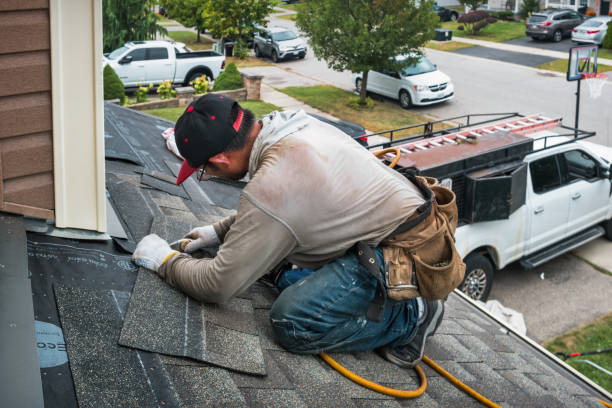 Professional Roofing technician working in Brunswick, ME